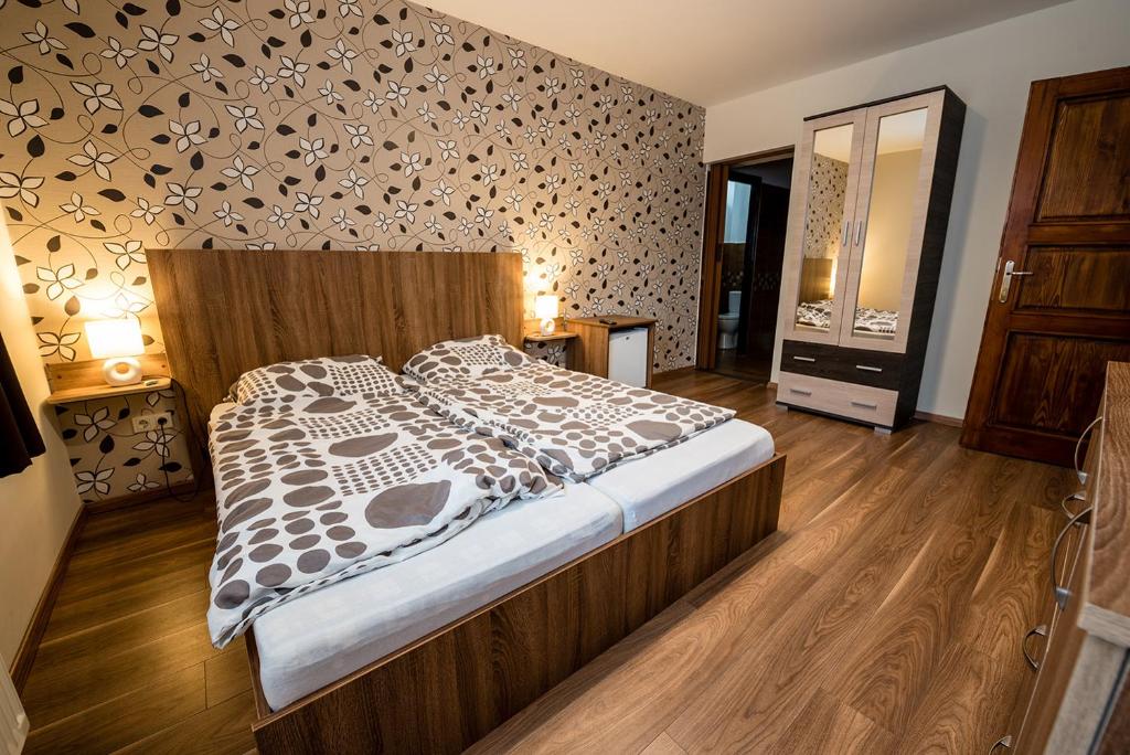 Postel nebo postele na pokoji v ubytování Shubu Zen Vendégház