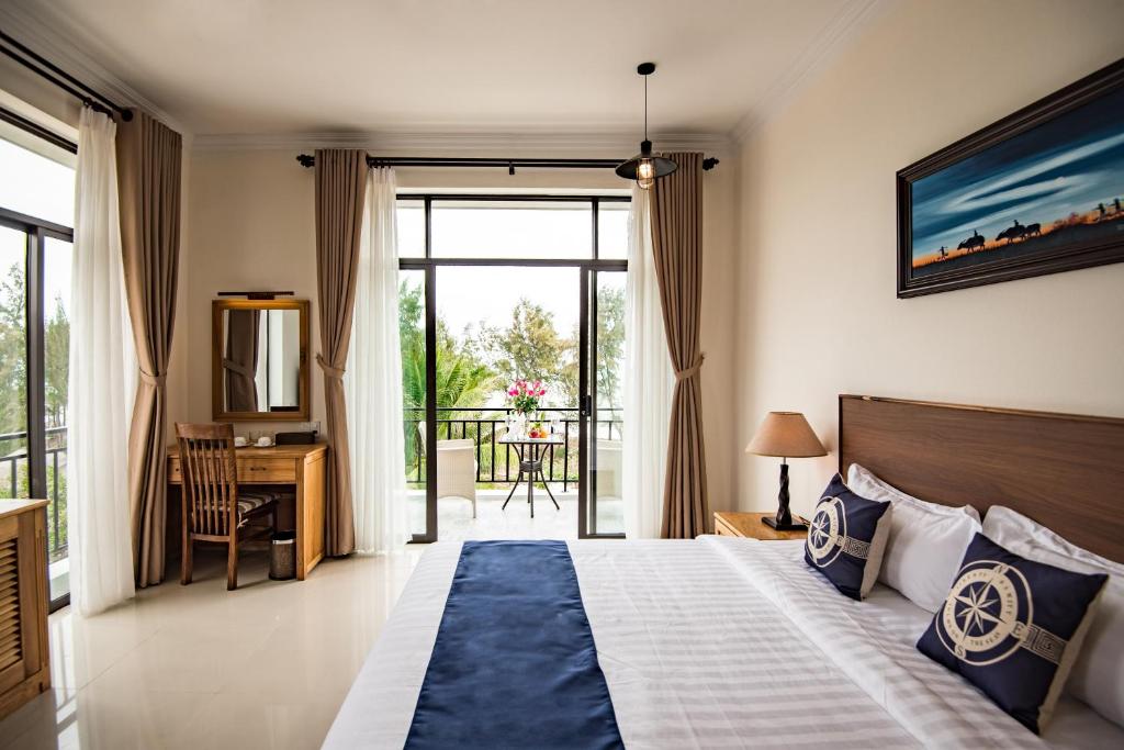 Postel nebo postele na pokoji v ubytování Santa Sea Villa