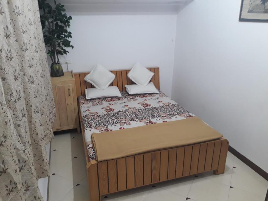 Postel nebo postele na pokoji v ubytování Bis-LIN Home Stay