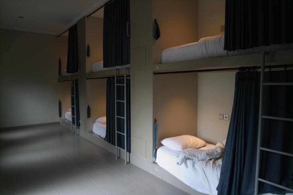 Postel nebo postele na pokoji v ubytování Home-Bience Hostel