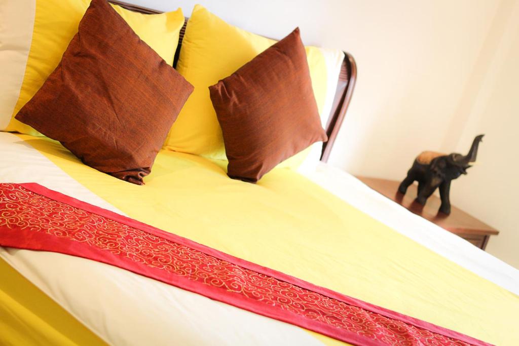 Postel nebo postele na pokoji v ubytování Thai Pura Resort