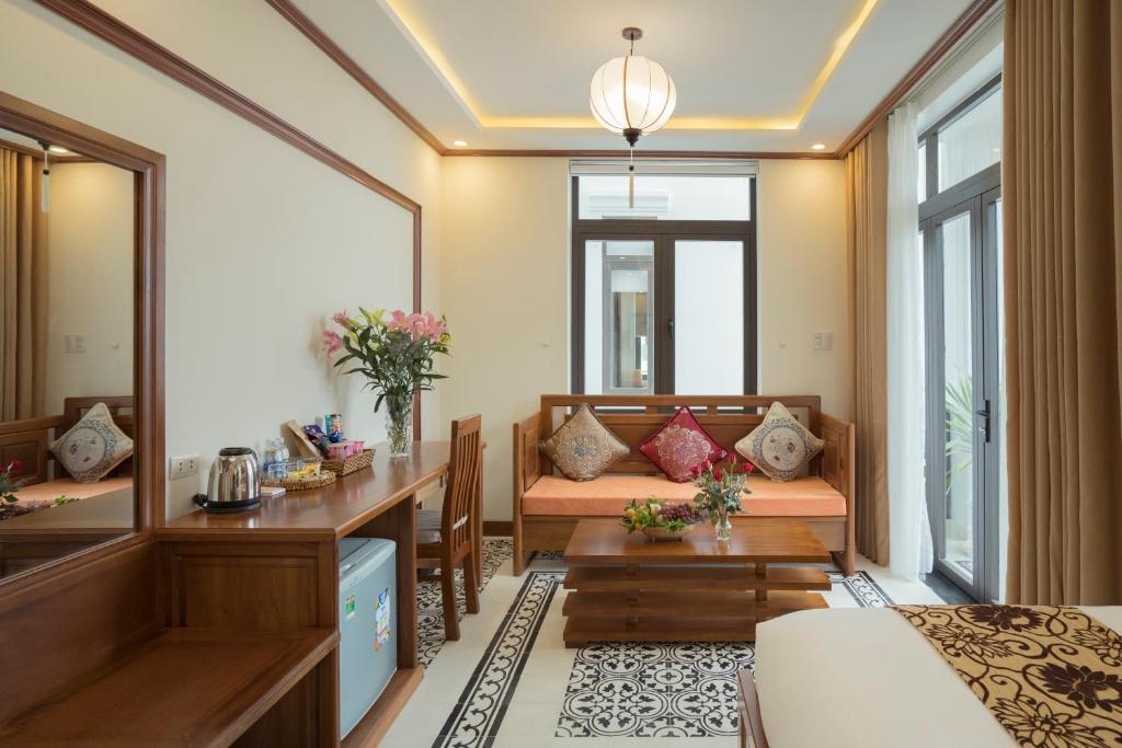 Posezení v ubytování Hoi An Discovery Villa