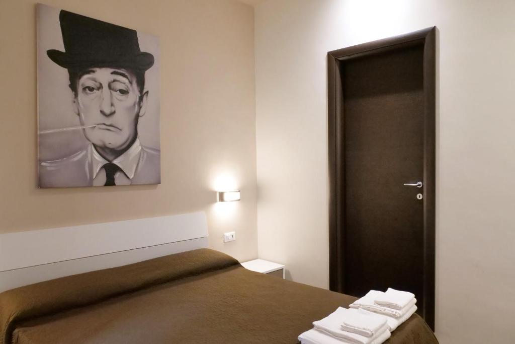 Posteľ alebo postele v izbe v ubytovaní B&B Il Campanile