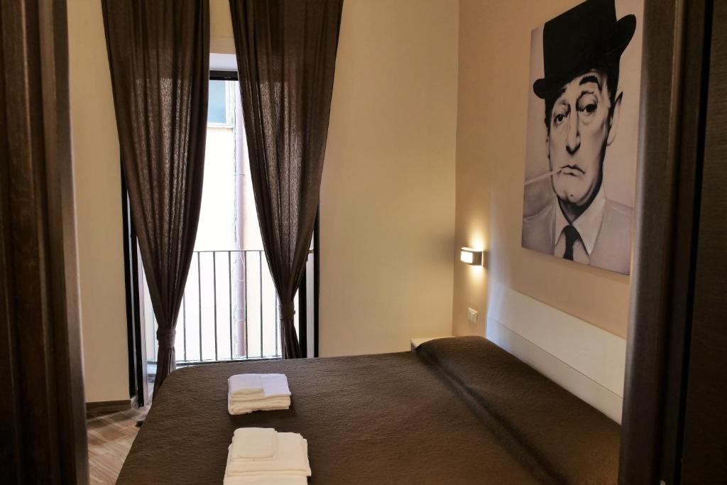 Posteľ alebo postele v izbe v ubytovaní B&B Il Campanile