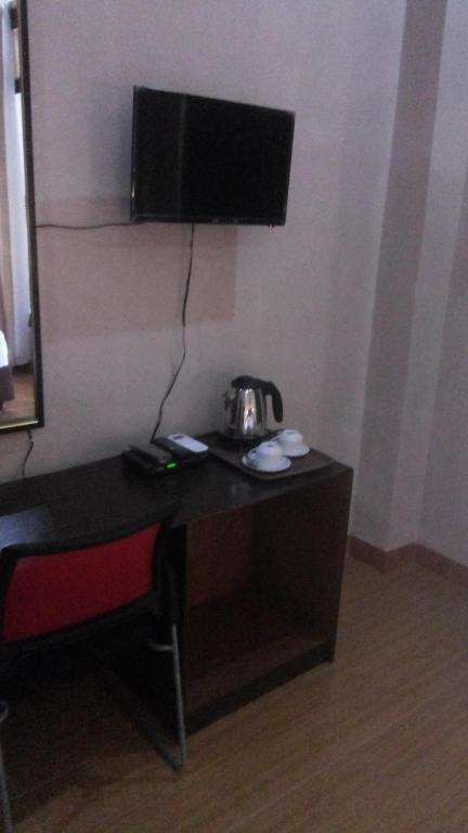 TV a/nebo společenská místnost v ubytování RF Hotel