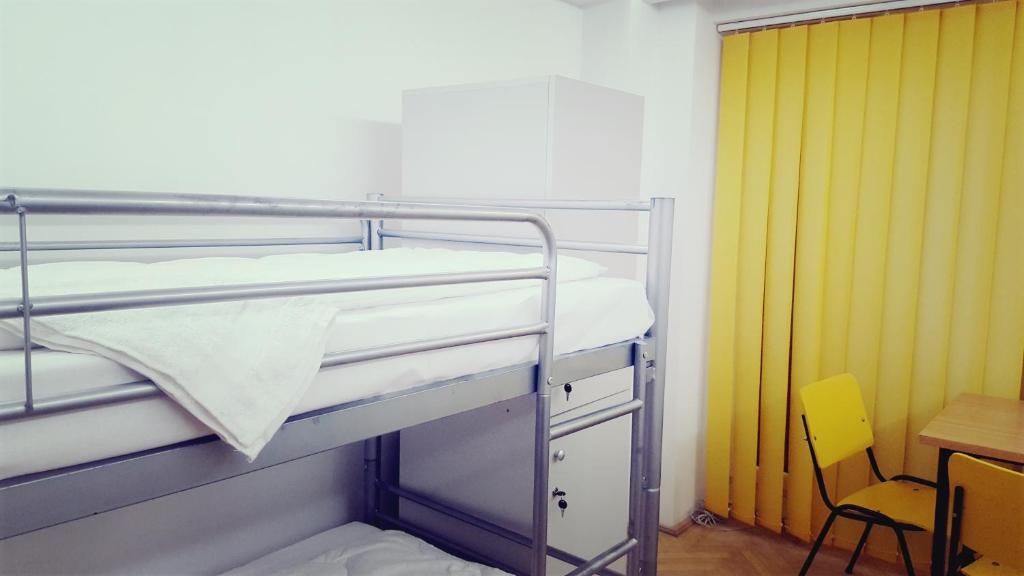 Postel nebo postele na pokoji v ubytování Sleep Inn Hostel