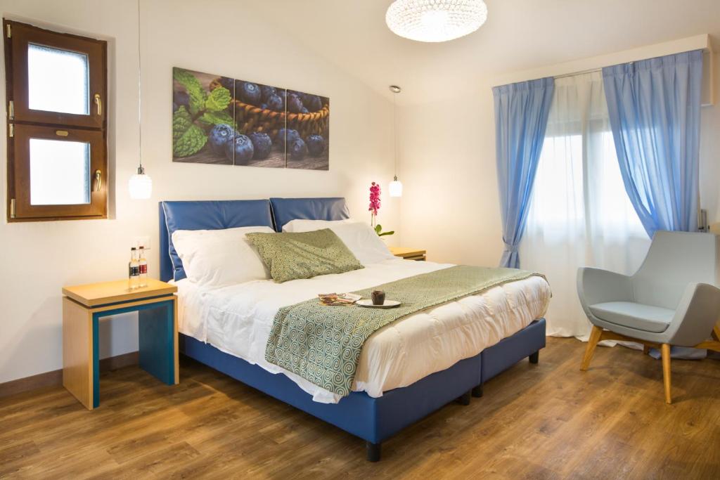 Postel nebo postele na pokoji v ubytování La Gustea Hotel & Cucina