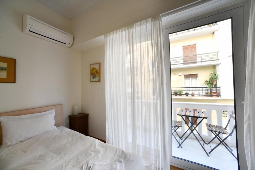 Posteľ alebo postele v izbe v ubytovaní Athens Squared Apartments