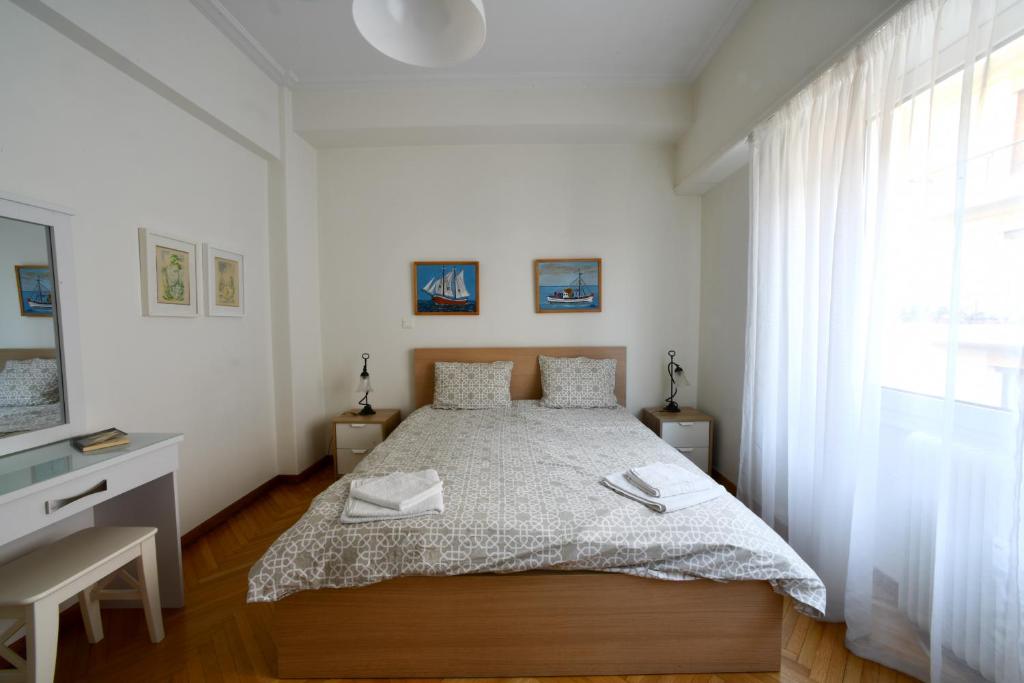Posteľ alebo postele v izbe v ubytovaní Athens Squared Apartments