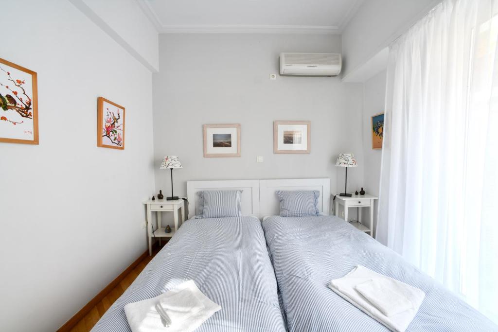 Posteľ alebo postele v izbe v ubytovaní Athens Squared Apartments