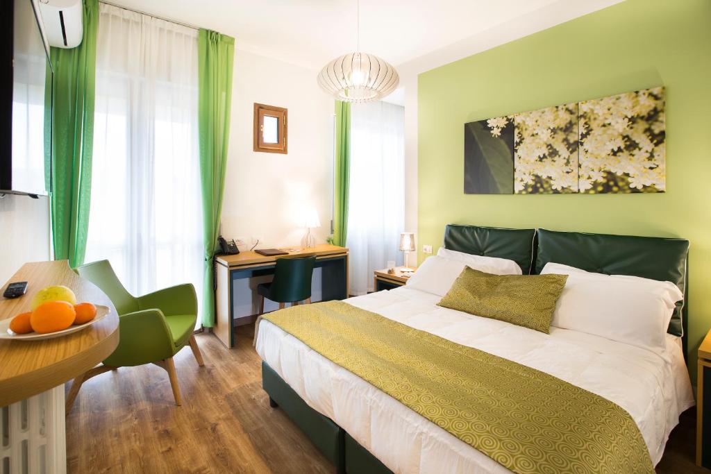 Postel nebo postele na pokoji v ubytování La Gustea Hotel & Cucina