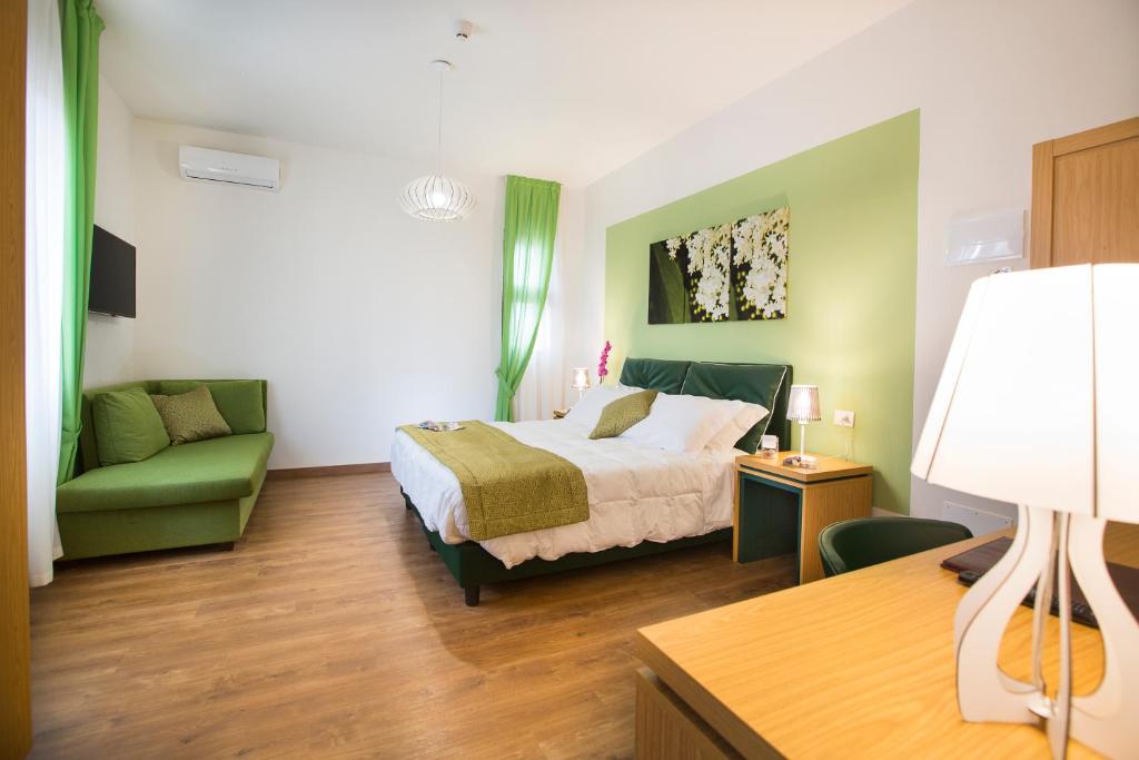 Postel nebo postele na pokoji v ubytování La Gustea Hotel & Cucina