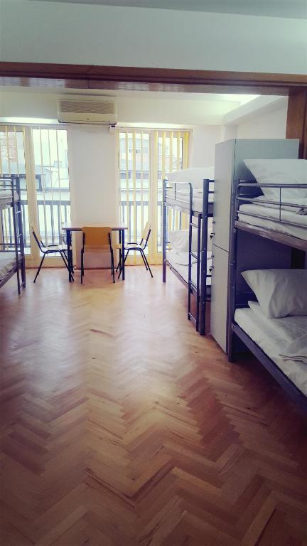 Postel nebo postele na pokoji v ubytování Sleep Inn Hostel