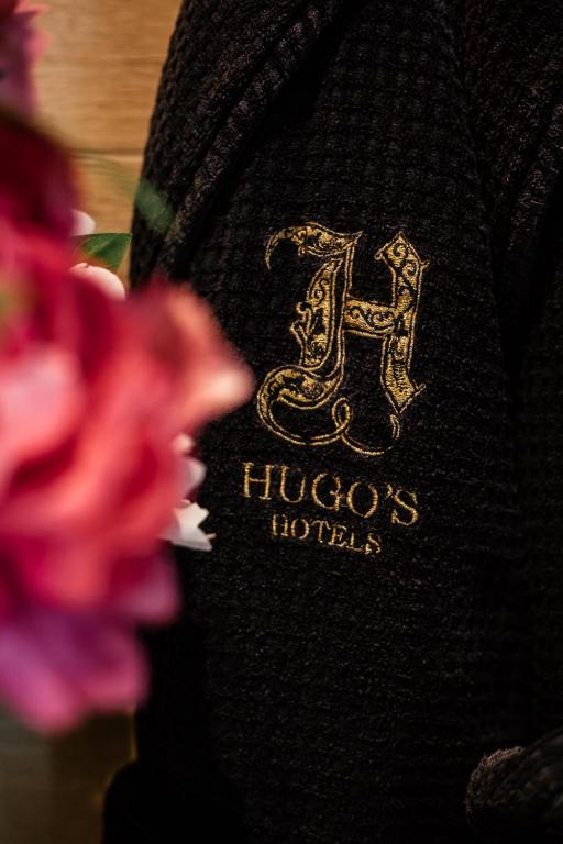 Certifikát, hodnocení, plakát nebo jiný dokument vystavený v ubytování Hugo's Boutique Hotel - Adults Only