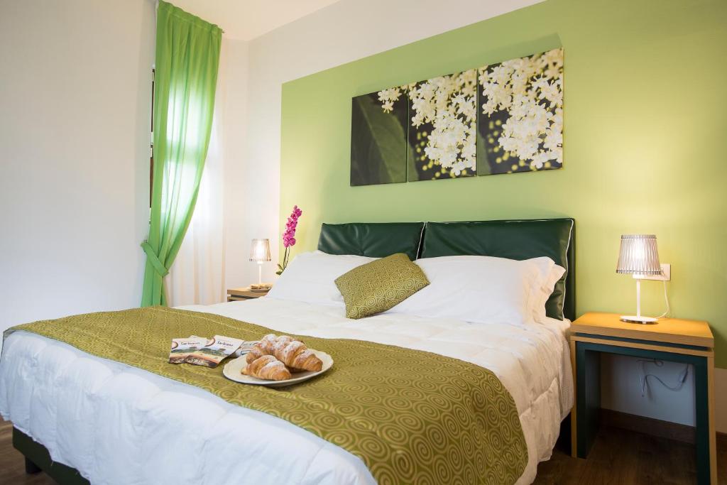 Postel nebo postele na pokoji v ubytování La Gustea Hotel & Cucina