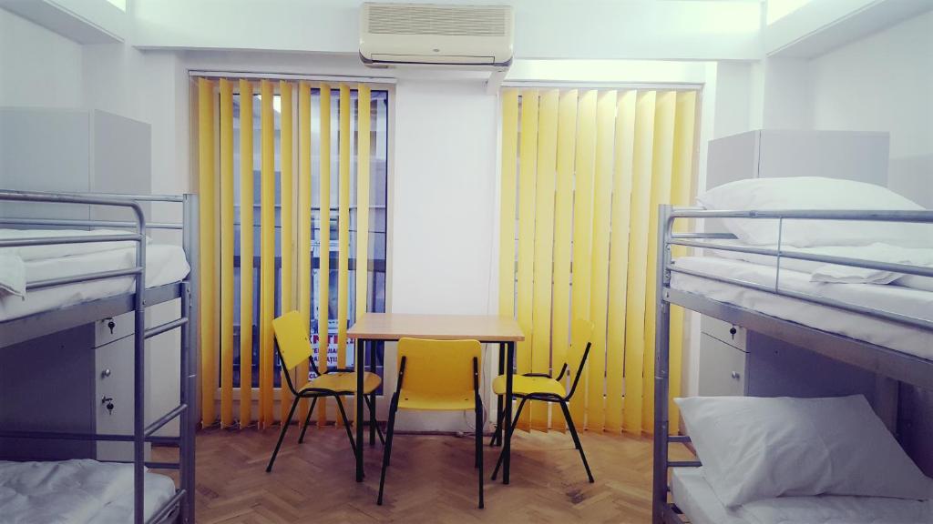 Postel nebo postele na pokoji v ubytování Sleep Inn Hostel