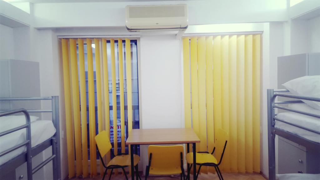 Postel nebo postele na pokoji v ubytování Sleep Inn Hostel