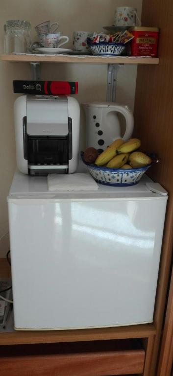 Kuchyň nebo kuchyňský kout v ubytování Quarto/Suite de Charme