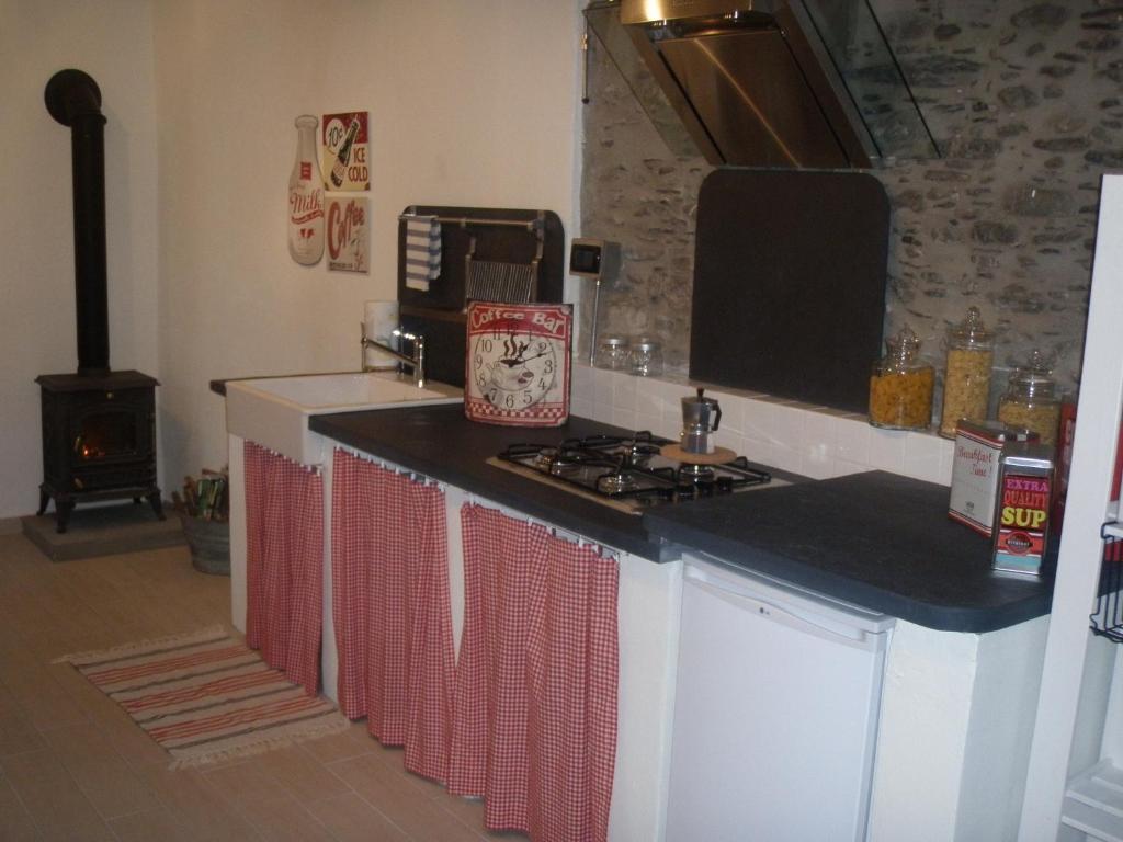 Kuchyň nebo kuchyňský kout v ubytování Casa La Rosa