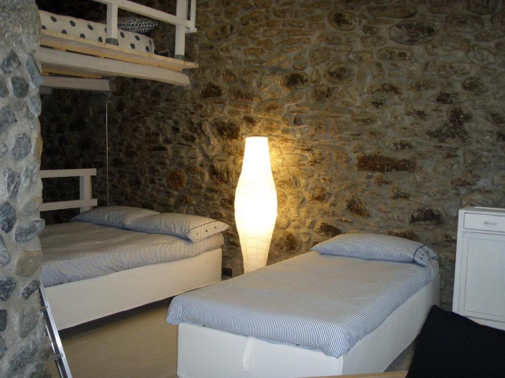 Postel nebo postele na pokoji v ubytování Casa La Rosa