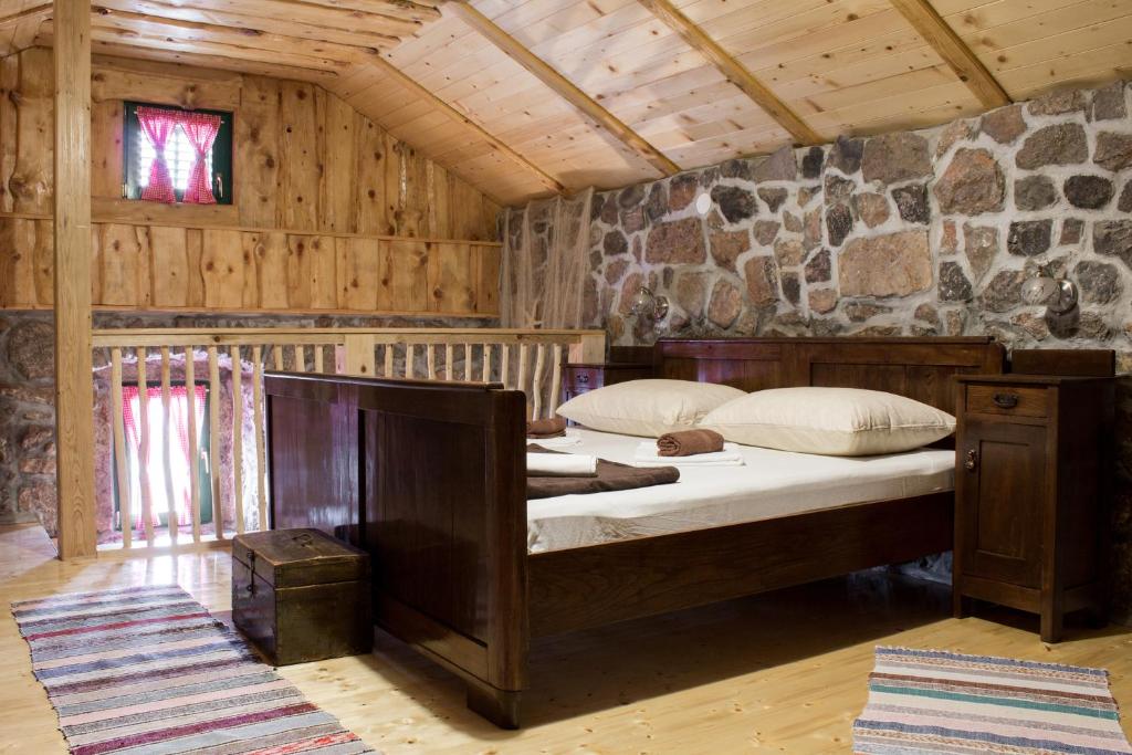 Postel nebo postele na pokoji v ubytování Solovi Dvori