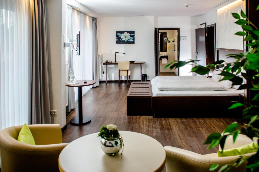 Postel nebo postele na pokoji v ubytování Hotel Bolte