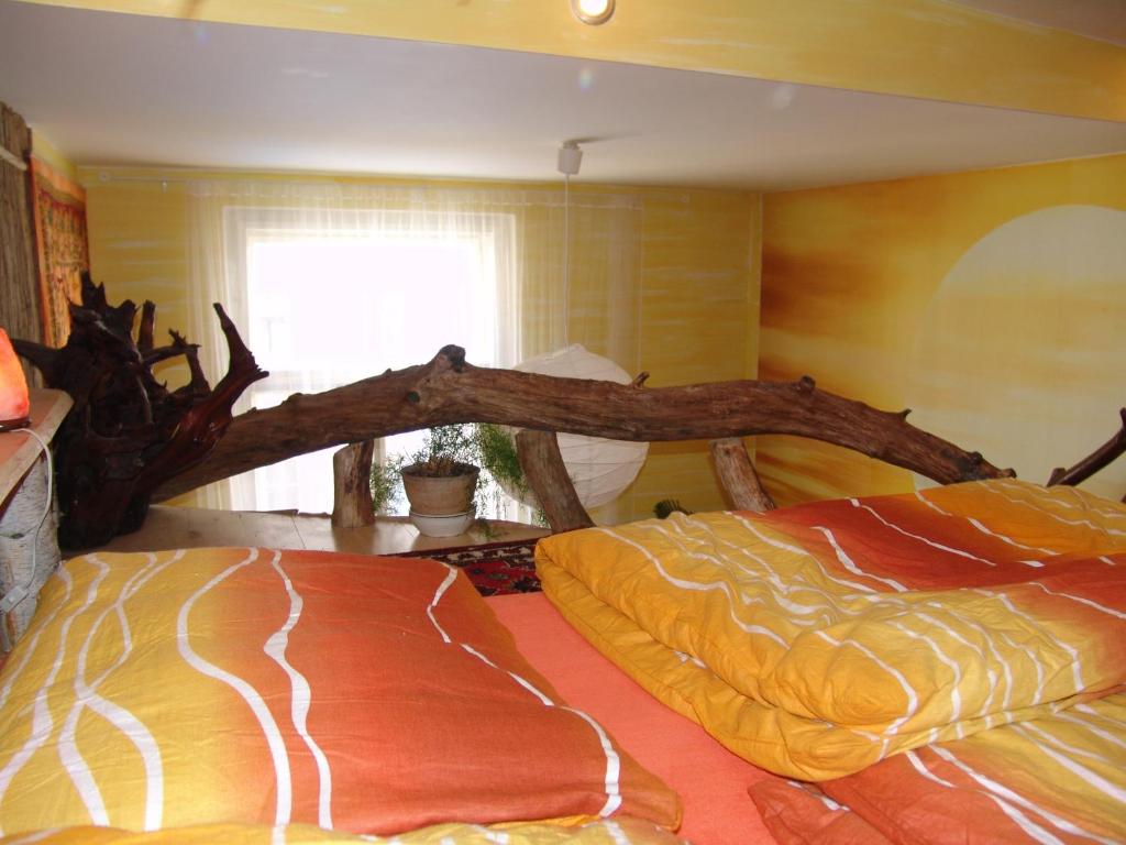 Postel nebo postele na pokoji v ubytování ARTHARMONY Pension & Hostel