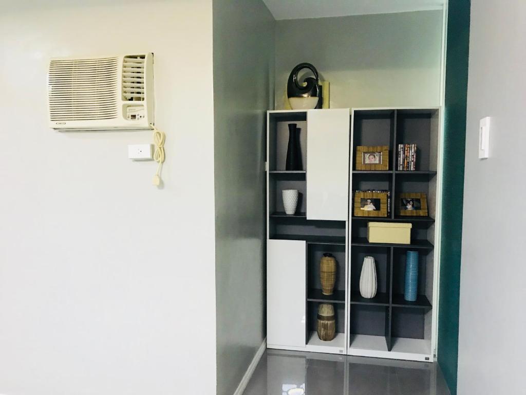 Fotografie z fotogalerie ubytování Hillary Timog Park Homes v destinaci Angeles