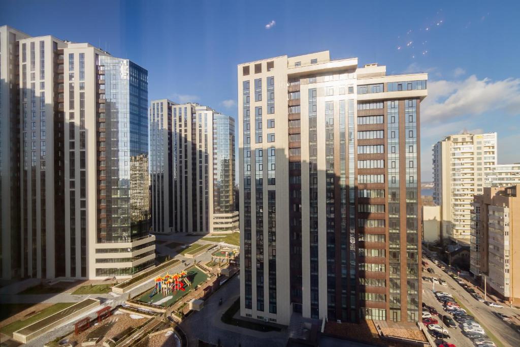 a view of a city with tall buildings at Panorama Apartment in Dnipro