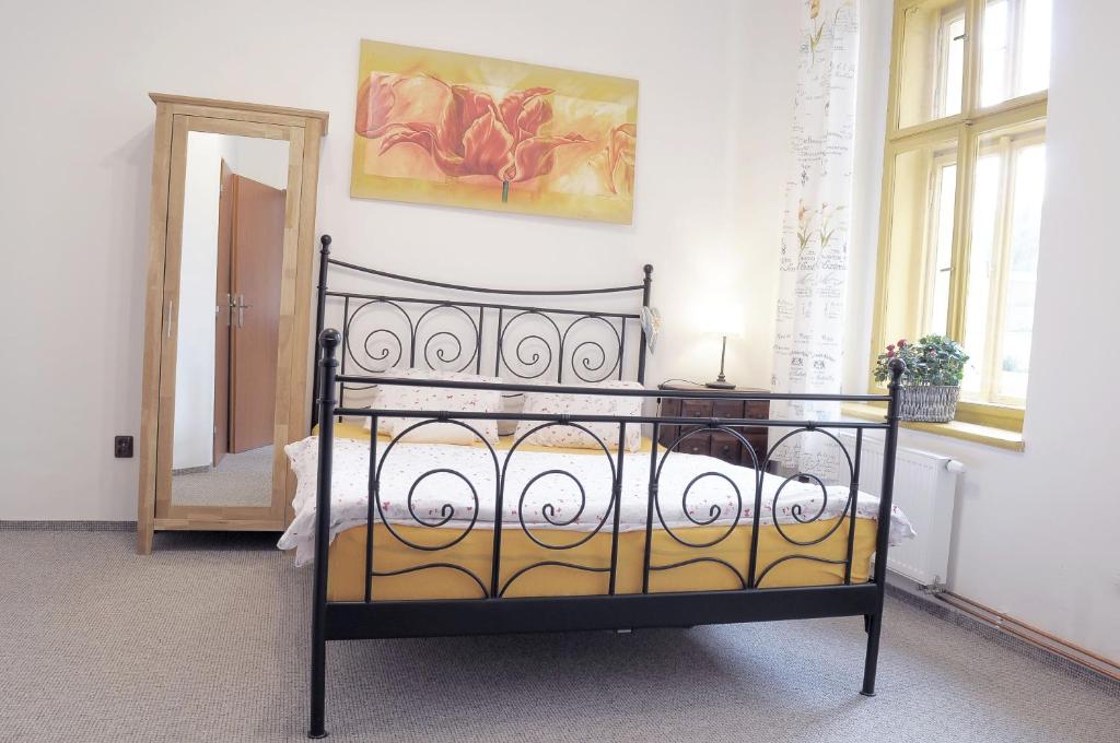 Łóżko lub łóżka w pokoju w obiekcie Apartmány V Podzámčí II.