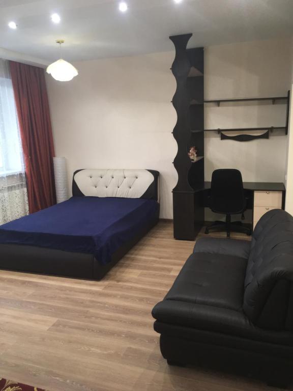
Гостиная зона в Luxe Apartment Kirova 99b

