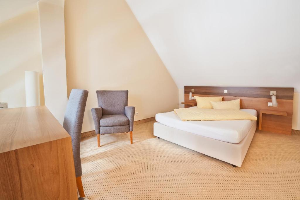 Postel nebo postele na pokoji v ubytování allgovia hotel garni