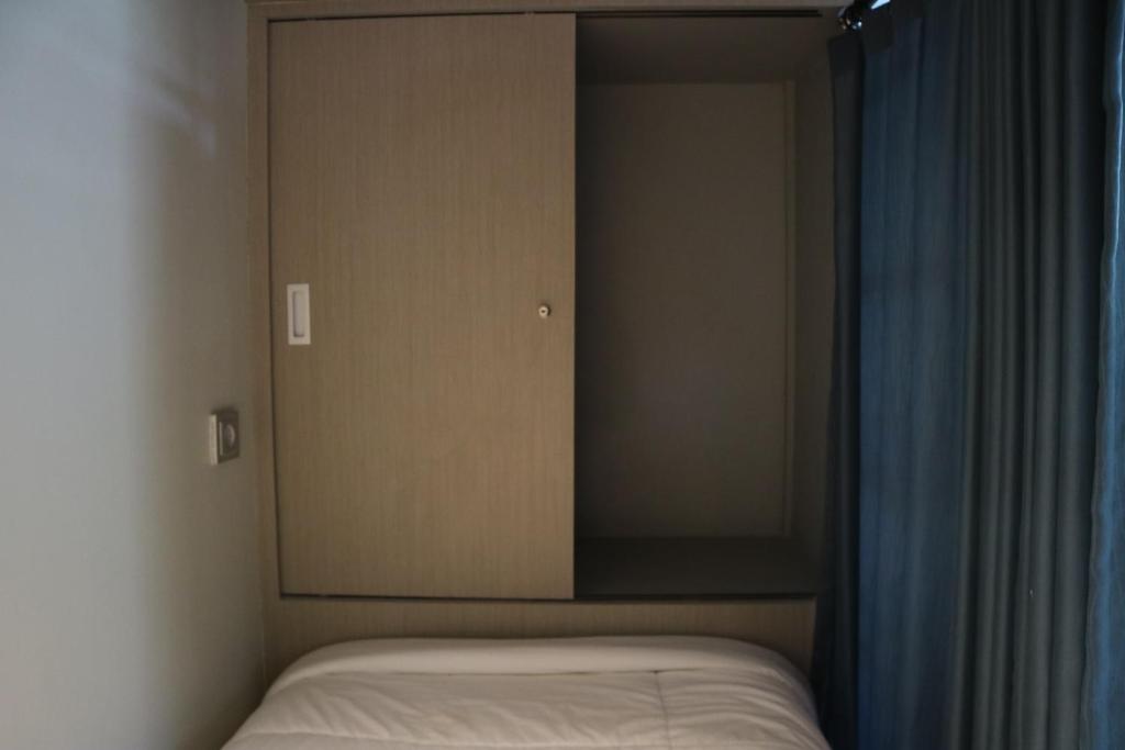 Postel nebo postele na pokoji v ubytování Home-Bience Hostel