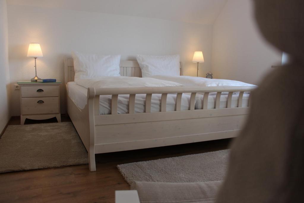 מיטה או מיטות בחדר ב-Ferienhaus Nadia