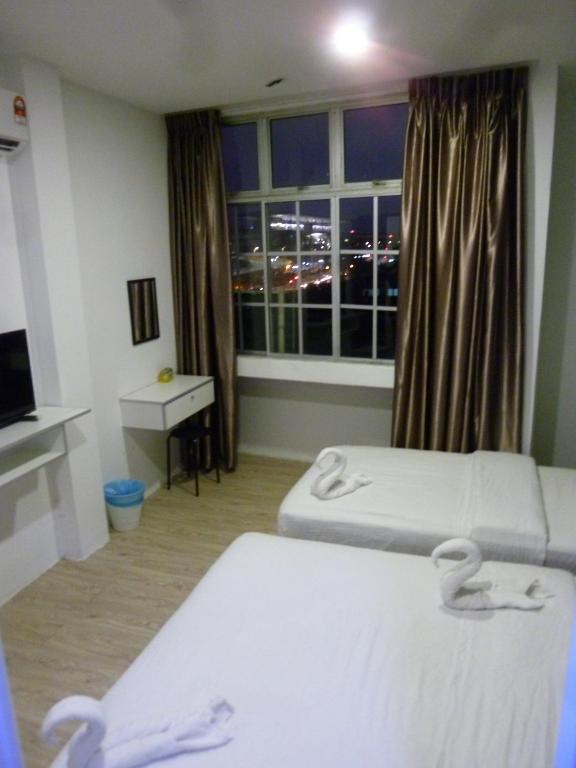 Postel nebo postele na pokoji v ubytování The b'Hotel