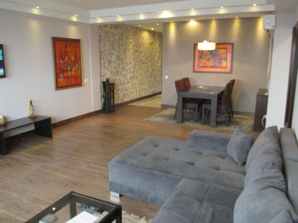 A seating area at Genex Apartment