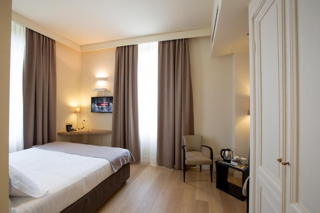 Postel nebo postele na pokoji v ubytování Hotel 900