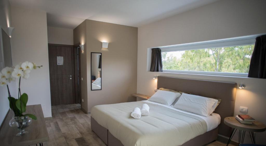 Postel nebo postele na pokoji v ubytování B&B Sorahnia - Design House