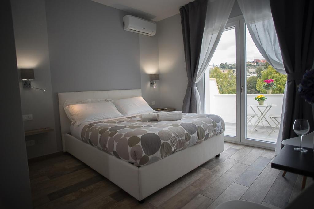 Postel nebo postele na pokoji v ubytování B&B Sorahnia - Design House
