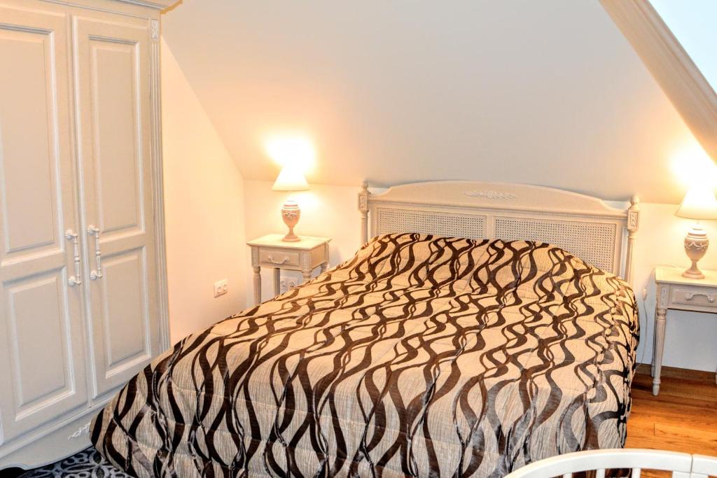 En eller flere senge i et værelse på Spindesys