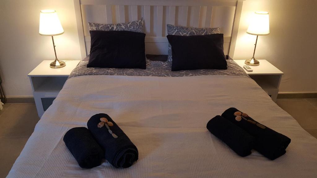 Postel nebo postele na pokoji v ubytování Bonanza Apartment