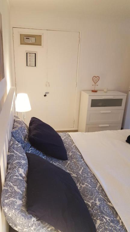 Postel nebo postele na pokoji v ubytování Bonanza Apartment