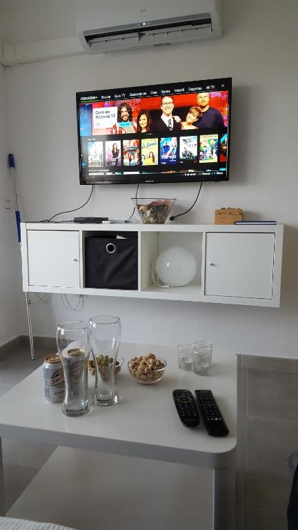 TV a/nebo společenská místnost v ubytování Bonanza Apartment