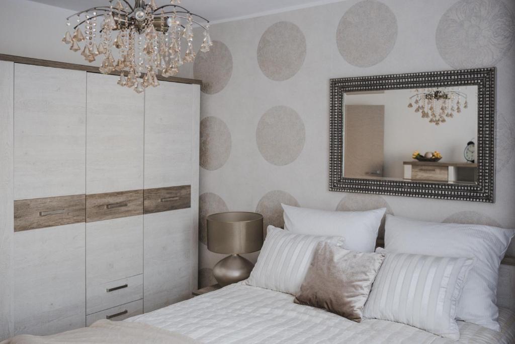 Postel nebo postele na pokoji v ubytování Apartament Hubalczyków