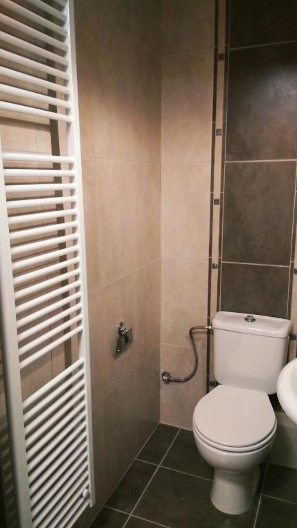Koupelna v ubytování Decosuite Junior Apartments