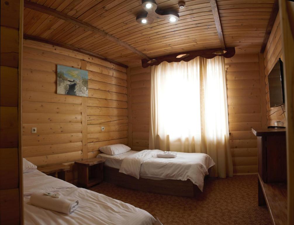 Postel nebo postele na pokoji v ubytování Cheremosh
