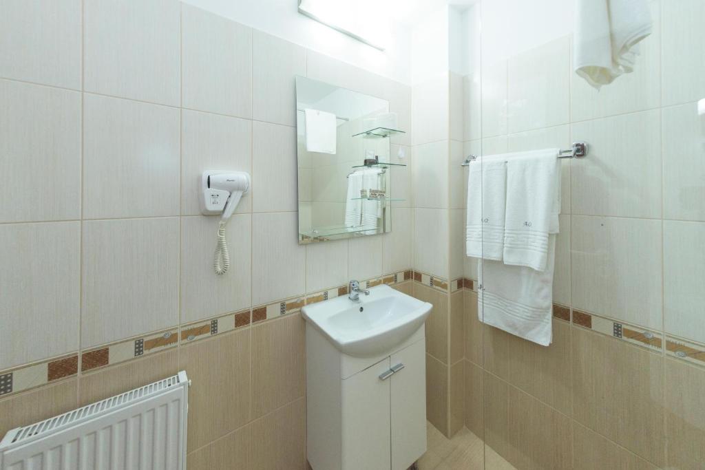 Koupelna v ubytování Hotel Promenada