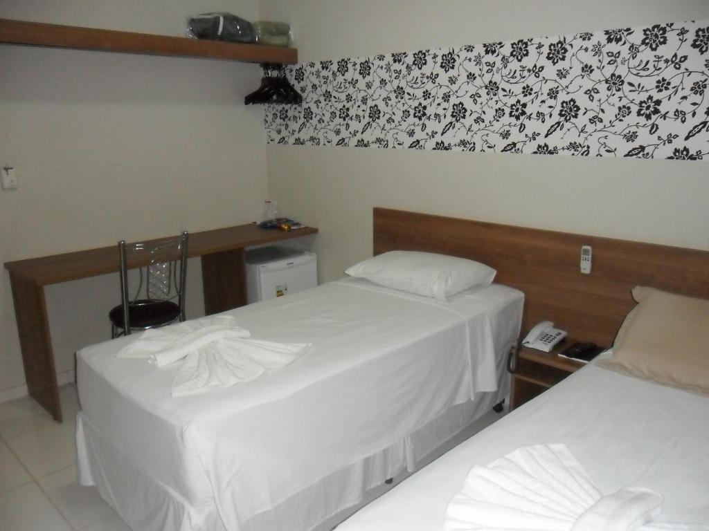 Postel nebo postele na pokoji v ubytování Hotel LG