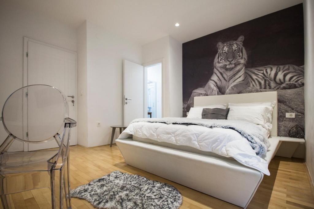 Posteľ alebo postele v izbe v ubytovaní Apartmani Leo-Marin