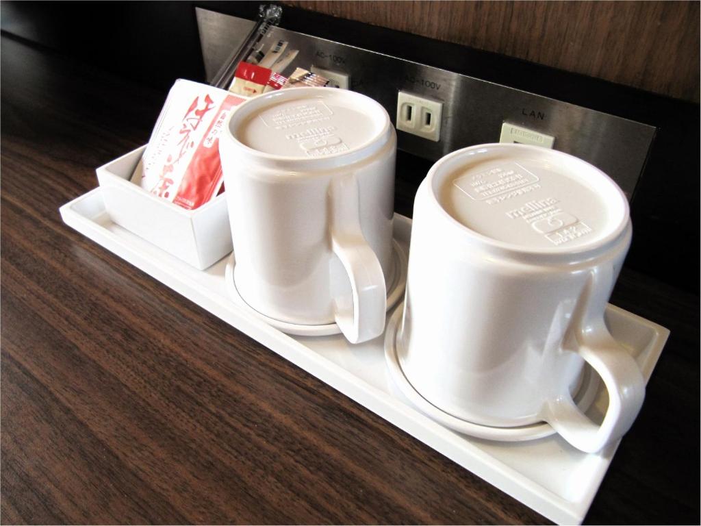 Příslušenství pro přípravu čaje a kávy v ubytování Central Hotel Okayama